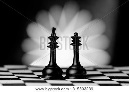 King And Queen, Chess Pieces On The Board. Chess Is A Popular Ancient Board Logic Antagonistic Game 