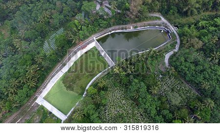 Reservoirs As Water Reserves For Agriculture. Agricultural Irrigation Systems With Rain-fed Water
