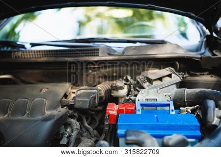 new lead-acid automotive electric battery replacement in old car