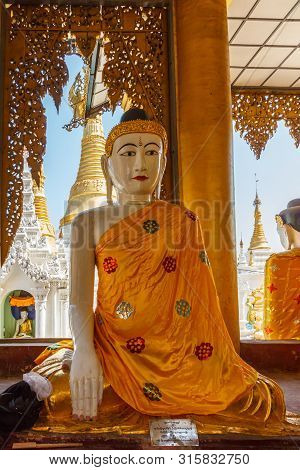Buddha Images In Shwedagon Pagoda. The Pagoda Is The Most Sacred In All Of Myanmar.