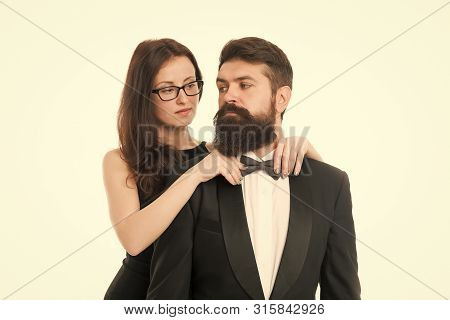 Let Me Help With Bow Tie. Woman Elegant Lady Adjust Male Bow Tie. Man Bearded Gentleman Wear Black T