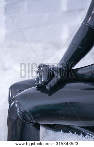 Man In The Latex Rubber Black Catsuit With Gasmask