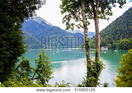 Beautiful Mountain Lake Ritsa. Ritsa Lake In The Mountains Of The Caucasus, In The Northwestern Part