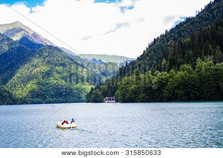 Beautiful Mountain Lake Ritsa. Ritsa Lake In The Mountains Of The Caucasus, In The Northwestern Part