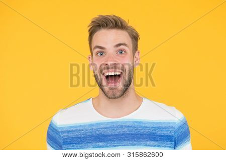 Hes Really Fun And Happy. Happy Man With Big Smile On Yellow Background. Handsome Guy With Beard And