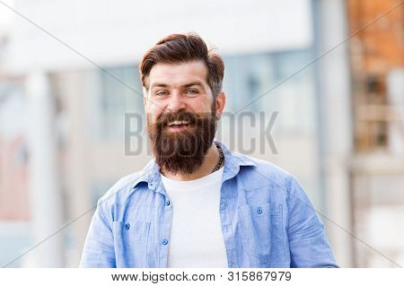 As Individual As You Are. Happy Hispter Outdoor. Confident And Handsome Brutal Man. Hair And Beard C