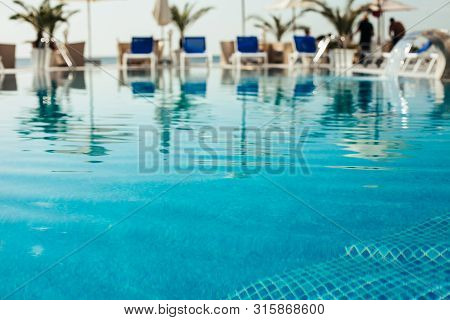 Swimming Pool At Luxury Resort, Hotel. 
Stock Photo