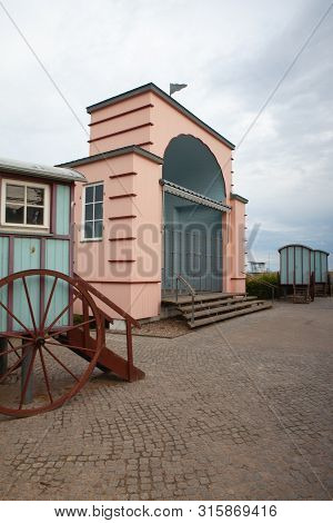 Historic Bathing Cars On The Promenade, Bansin Beach Resort, Germany. Funny Bathing Cabin On Usedom 