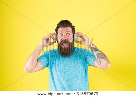 Wireless Headphones Deliver Clean Sound. Modern Technology. Hipster Happy Using Modern Wireless Head