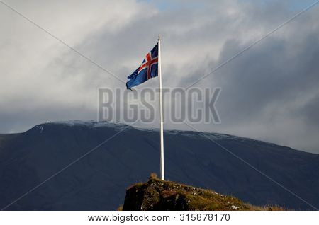 Icelandic Flag Flies At Thingvellir, Home Of The Original Icelandic Parliament