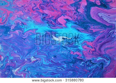 Abstract Red And Blue Marble Background. Bright Color. The Paint Flows Freely And Creates An Interes