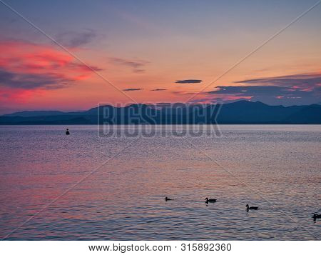 Spectacular Sunset View From The Village Of Bardolino On The Shores Of Lake Garda