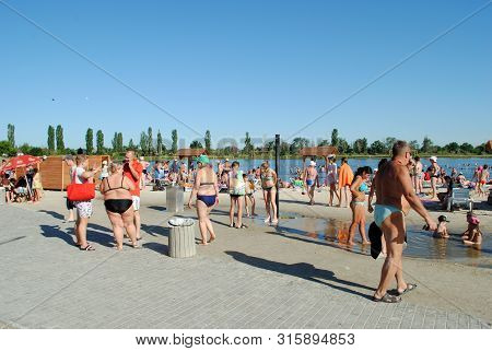 People Bathe In A Salt Lake At A Balneological Resort In Slavyansk Near Donetsk, Ukraine, June 15, 2