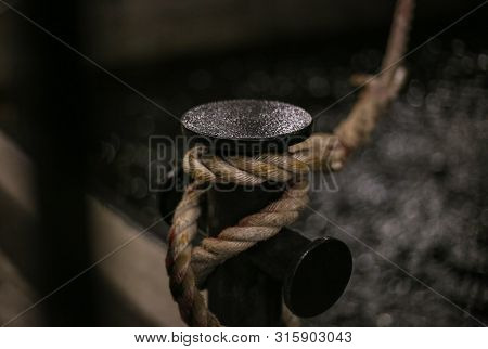 Rope Tied To Bollard Sailboat, Night Photo