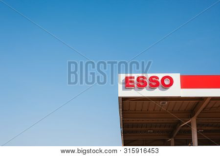 Lyon, France - February 26, 2019: Esso Logo On Its Gas Service Station In Lyon, France On Blue Sky B