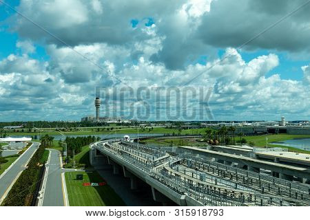 Orlando, Fl/usa-8/6/19: Exterior  View Of  The Tram Going From The New International  Terminal C To 