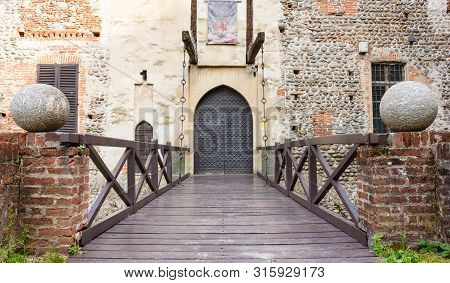 Rivarolo Canavese,italy-june,2019: Entrance With Drawbridge Of The Castle Of Malgrà / The Castle Was