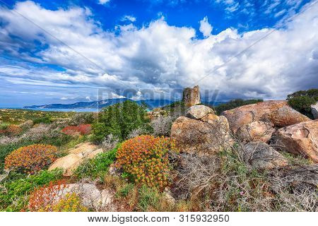 Fantastic View On Lagoon Of Porto Giunco With Turquoise Water And Old Tower. Location: Villasimius, 
