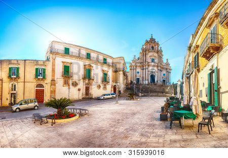 The Baroque Saint George Cathedral Of Modica And Duomo Square. Historic Center Builded In Late Baroq