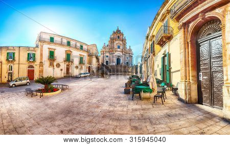 The Baroque Saint George Cathedral Of Modica And Duomo Square. Historic Center Builded In Late Baroq