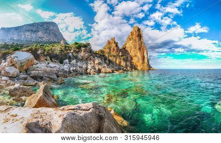 Spectacular View Of Punta Pedra Longa And Azure Water In Sea. Location: Baunei, Province Of Nuoro, S