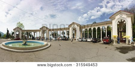 Gagra, Abkhazia - 02 May 2019: Panoramic View Of The Colonnade From Ardzinba Avenue. Popular Tourist