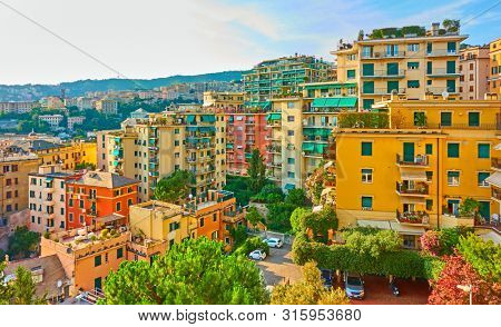 Picturesque residential buildings of Castelletto district in Genoa in the evening, Genova, Italy
