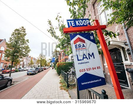 Haarlem, Netherlands - Aug 16, 2018: Te Koop To Sale Sign Near Real Estate Property In Netherlands W
