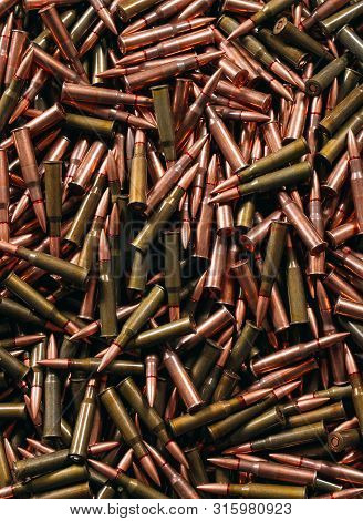 Different Ammo On Wooden Background, Weapon Concept.