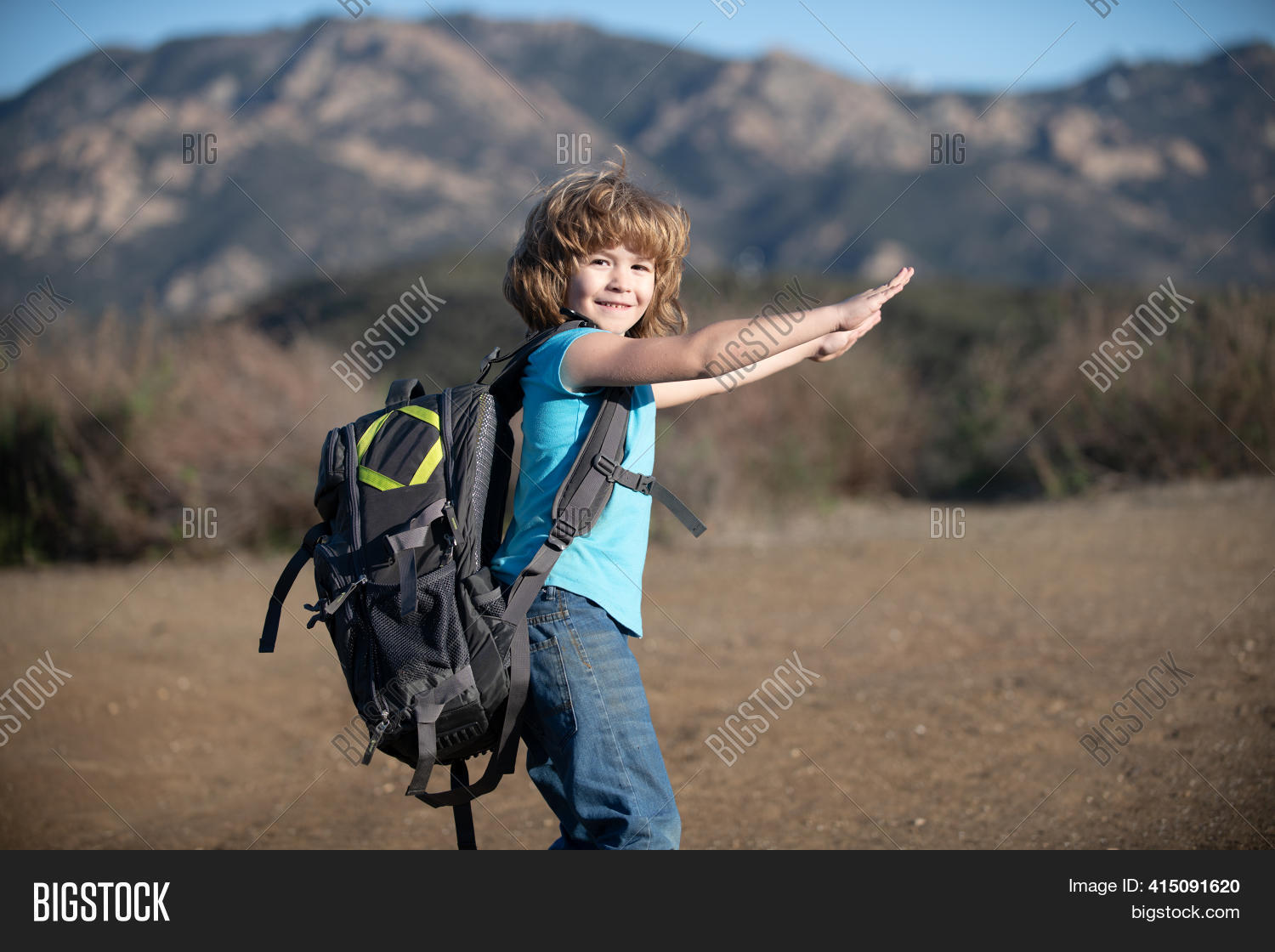 little kid with big backpack
