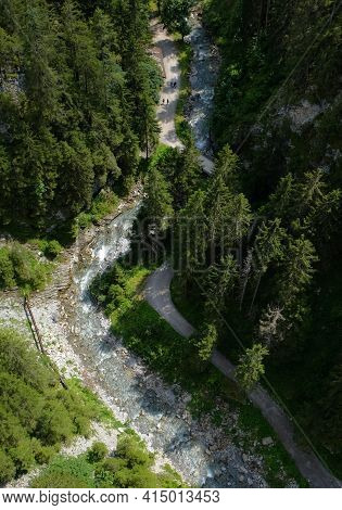 Valley With River Waterfall And Trees In Open Nature