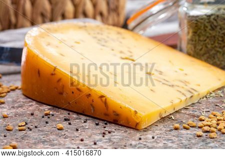 Cheese Collection, Piece Of Hard Yellow Dutch Gouda Cheese With Dried Caraway Or Cumin Seeds