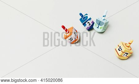 Festive Hanukkah Dreidel With Copy Space. High Quality And Resolution Beautiful Photo Concept