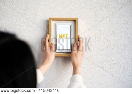 Non-fungible Token Nft, Crypto Art, Digital Art, New Type Of Cryptorurrency. Cell Phone With Golden 