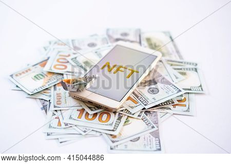 Non-fungible Token Nft, Crypto Art, Digital Art, New Type Of Cryptorurrency. Cell Phone With Golden 