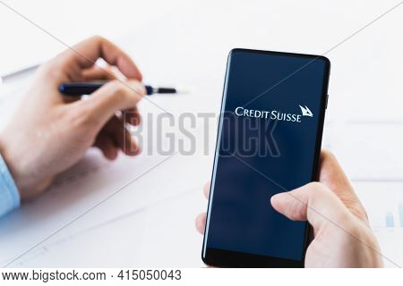 Russia Moscow 29.03.2021 Mobile Phone With Logo Of Credit Suisse Swiss Bank.investment Finance Compa