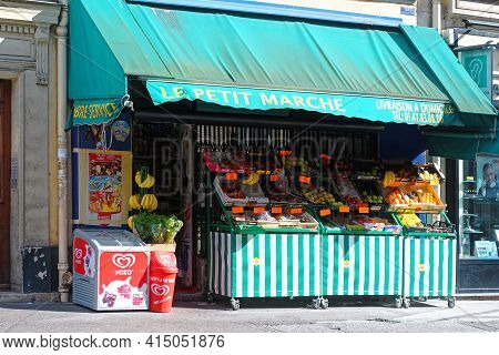 Paris, France, June 21: A Mini Grocery Store Selling Vegetables On Vaugirard Street In The Early Mor