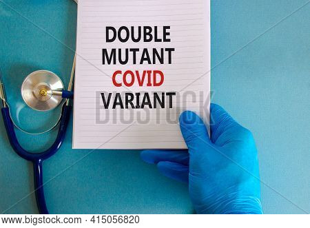 Covid-19 Double Mutant Symbol. Doctor Hand In Blue Glove With White Card. Concept Words 'double Muta