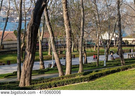 15 Mart 2021 Istanbul - Turkiye Gulhane Park And People Walking