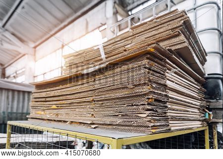 Stack Prepared Pile Of Used Compressed Corrugated Cardboard And Waste Paper Wrap Collected For Recyc