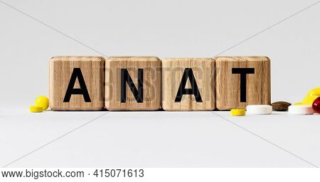 Cubes With The Word Anat On Them. Care Concept.