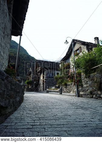 Panorama View Of Old Historic Traditional Schist Stone Rock Buildings Houses In Picturesque Quaint C