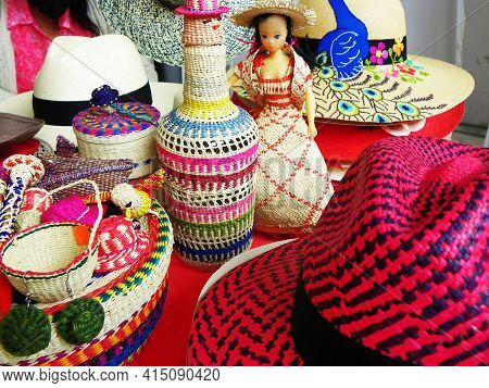 Wicker Souvenirs: Baskets, Dolls, Bottles, Vases, Hats Made From Toquilla Straw, Vegetable Fiber, An