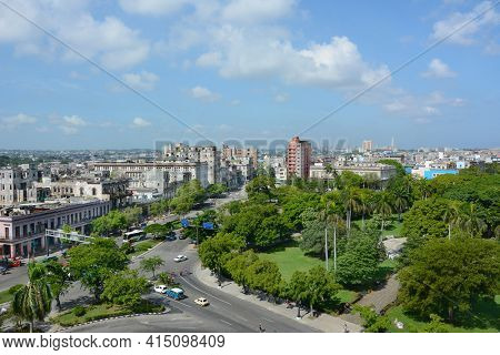 HAVANA, CUBA - JULY 24, 2016: Havana City seen from the Iberostar Parque Central Hotel. In the foreground is Parque Central looking towards the city.