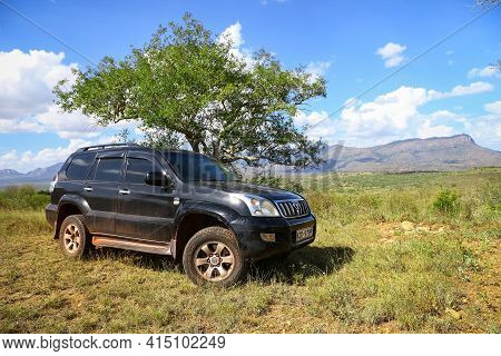 Taita Hills, Kenya - February 3, 2021: Offroad Car Toyota Land Cruiser Prado 120 At The Top Of The H