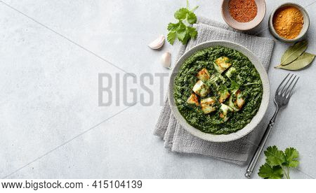 Palak Paneer On Concrete Background, Top View, Copy Space