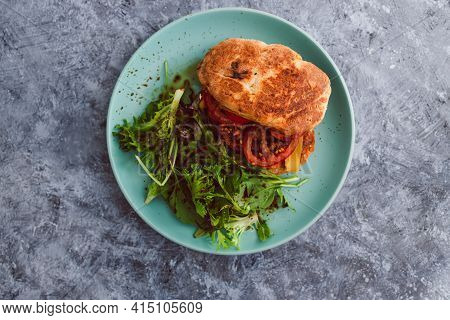 Vegan Burger With Turkish Bread Bun Tomatoes Dairy-free Cheese And Plant-based Patty Served With Sid