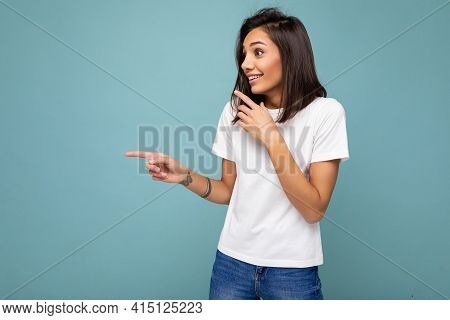 Portrait Of Beautiful Fascinating Emotional Positive Joyful Happpy Female Promoter Pointing To The S