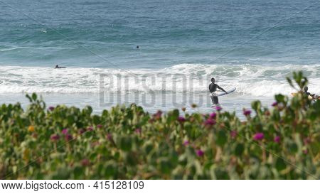 Encinitas, California Usa - 23 Feb 2020: Surfers In Ocean, Pacific Coast Big Blue Sea Water Waves. P