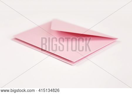 Stack Of Light Pink Open Envelope On White Isolated Background. Two Envelopes For Invitations, Certi